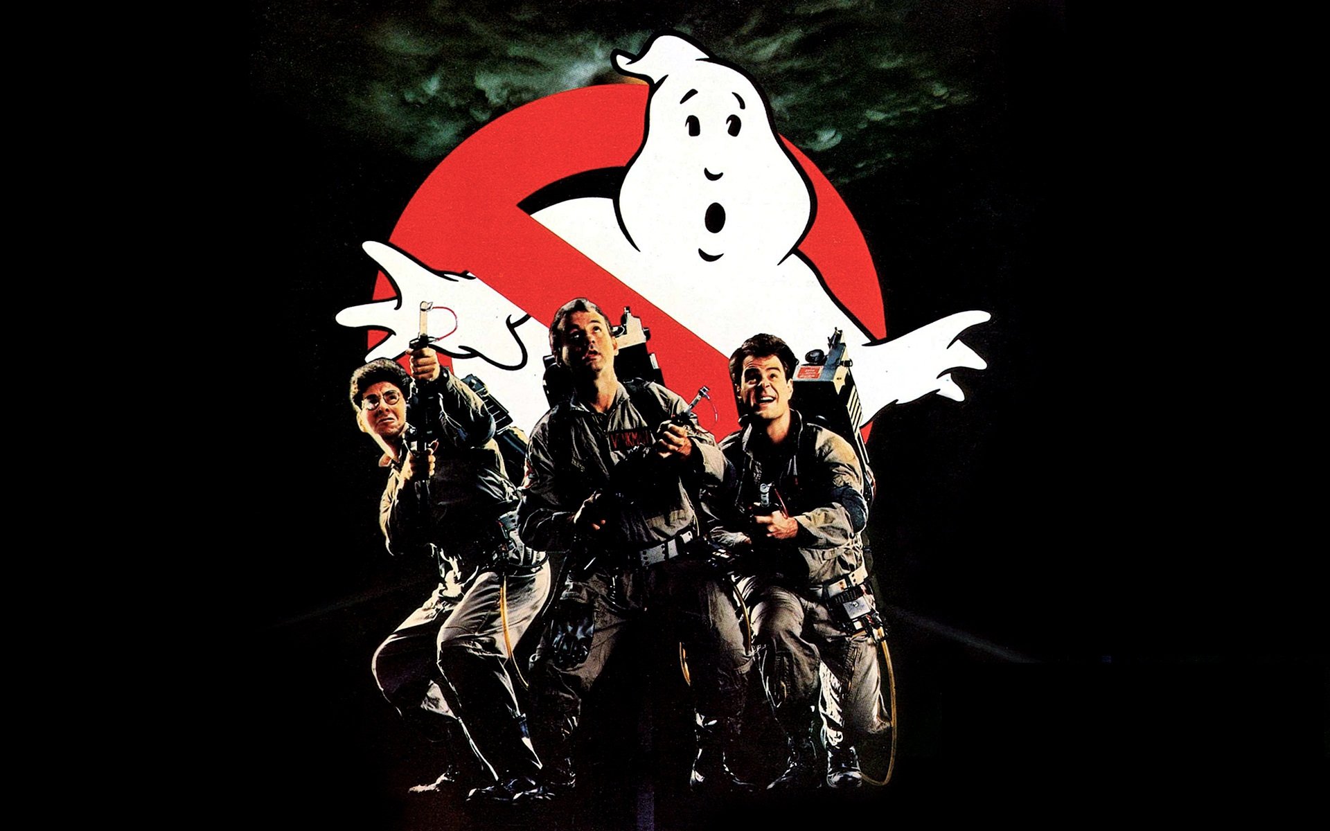 Ghostbusters охотники за привидениями. Охотники за призраками 1984. Логотип охотников за привидениями. Охотники за привидениями 1984 обои.