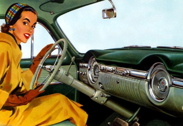 Девушка за рулем ретро автомобиля