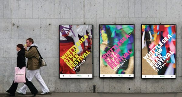 Рекламный плакат на стене