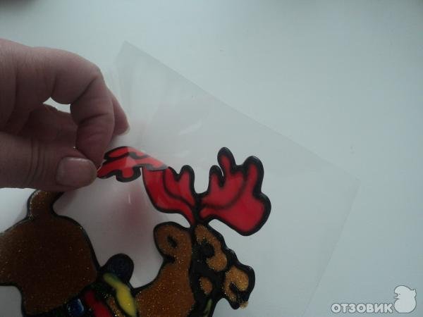 Резиновая наклейка на окно