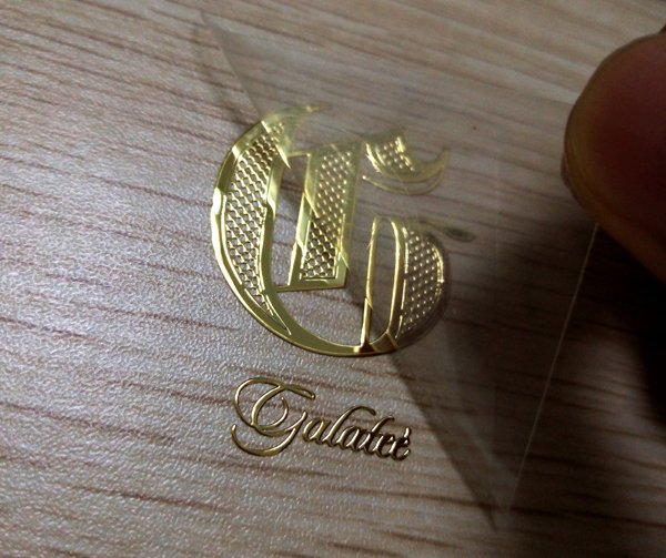 Металлизированные наклейки логотип