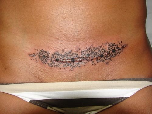 Тату кот на животе