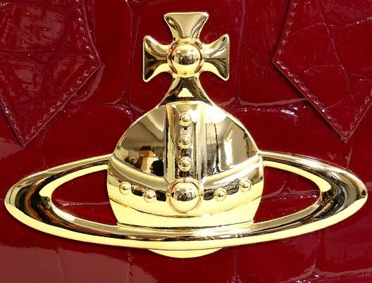 Вивьен Вествуд знак