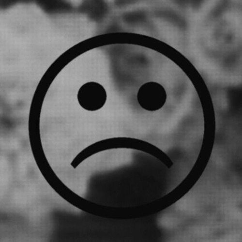 Грустный смайлик черный