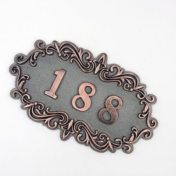 Табличка с номером квартиры