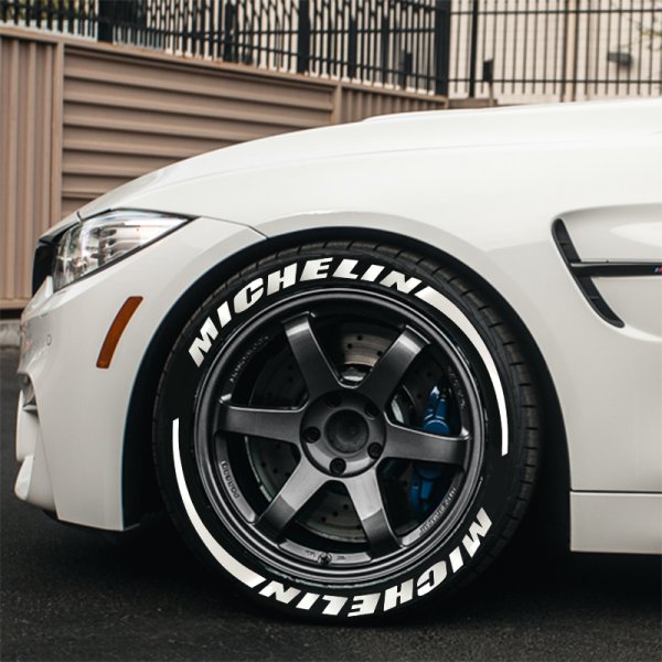 Резина с белыми надписями