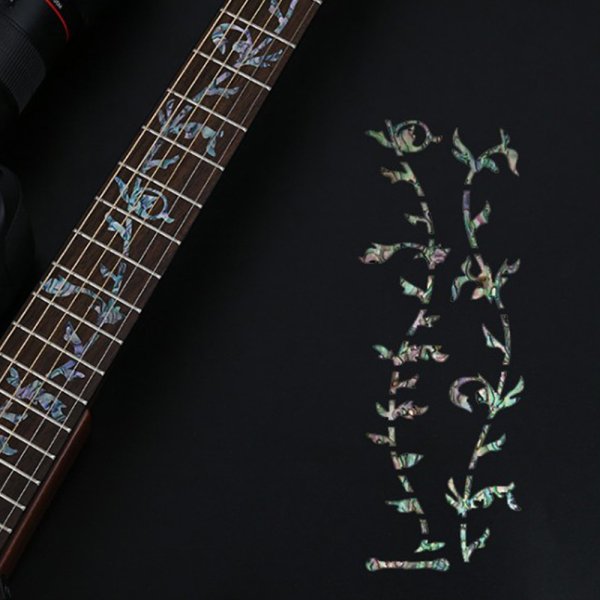 Инкрустация на грифе электрогитары