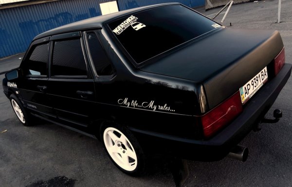 ВАЗ 2114 черная тонированная с наклейками