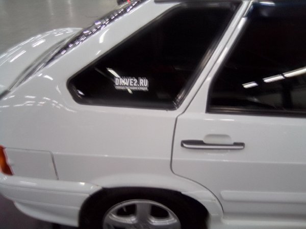 ВАЗ 2114 С наклейкой Лада спорт