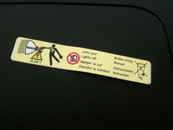 Наклейка на фару под ксенон Mitsubishi