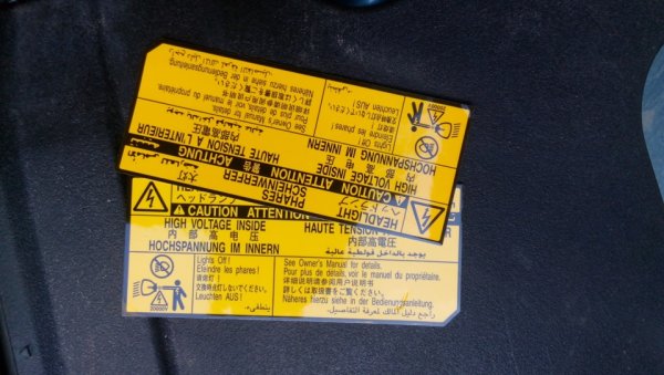 Наклейка на фару под ксенон Mitsubishi