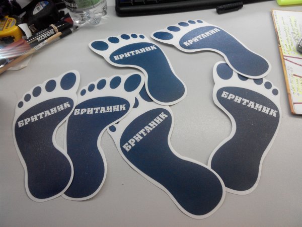 Рекламные наклейки на пол