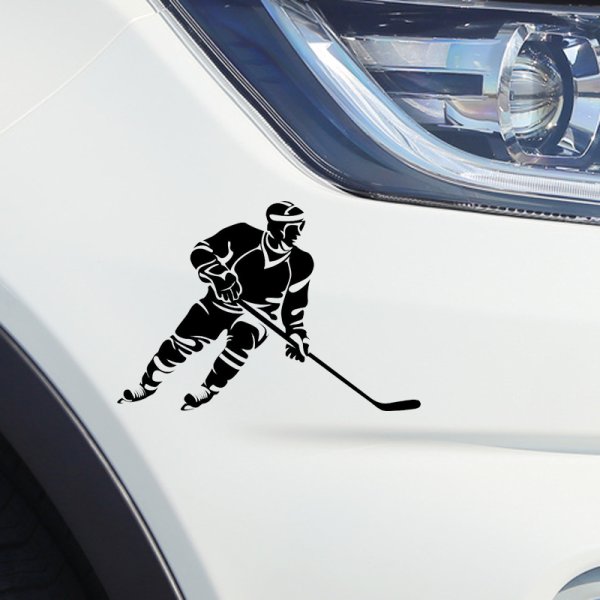 Силуэт хоккеиста с клюшкой