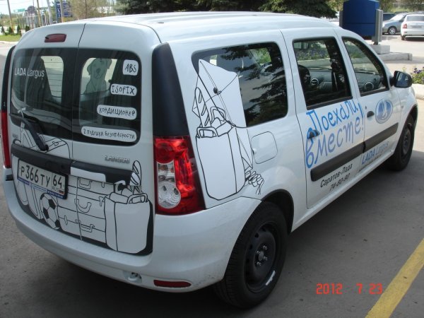 Лада Ларгус белый Ларгус с наклейками