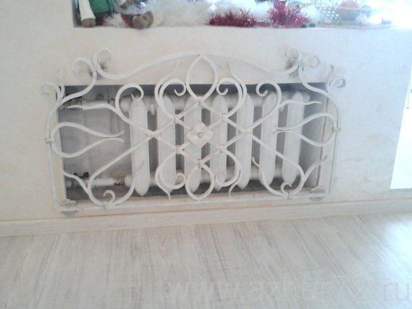 Кованная решетка на батарею