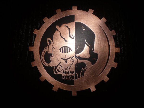 Вархаммер 40000 Адептус Механикус символ