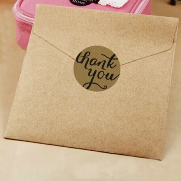 Упаковка в крафт бумагу с наклейкой