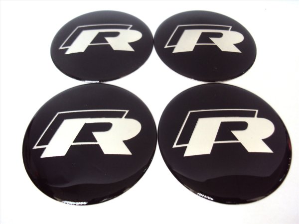 Заглушки на литые диски с логотипом Санг енг