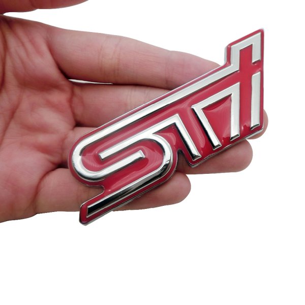 Субару STI лого