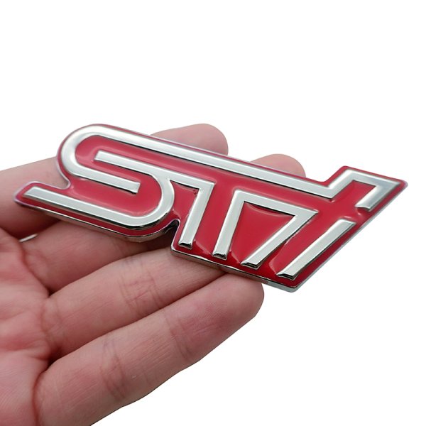 STI наклейка