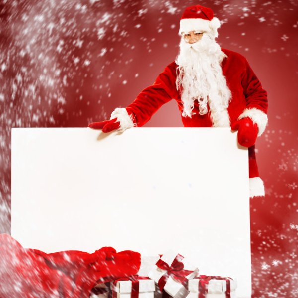 Дед Мороз держит картину