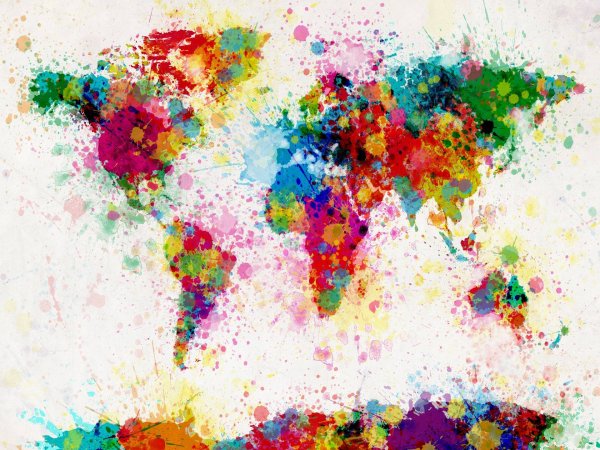 Разноцветные брызги краски на стене