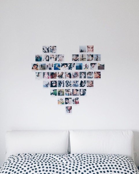 Сердце из фотографий на стене