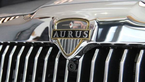 Аурус значок