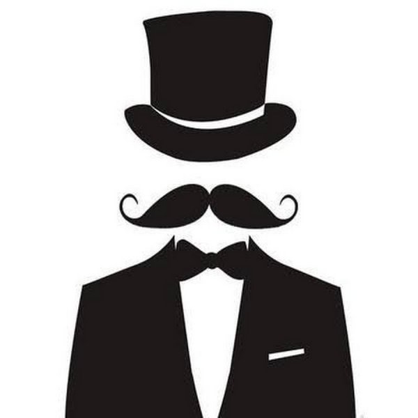 Мужчина в костюме и шляпе