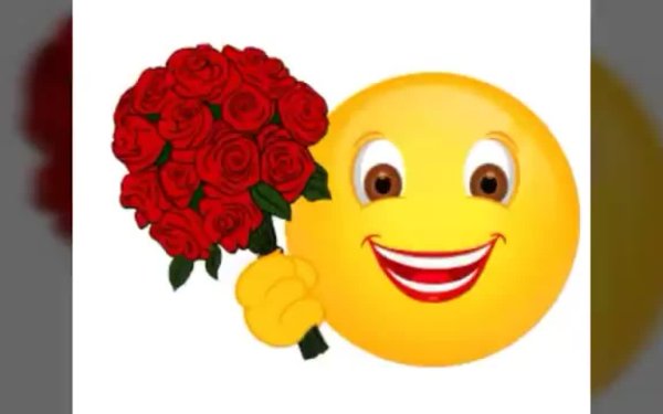 Смайлик дарит цветы