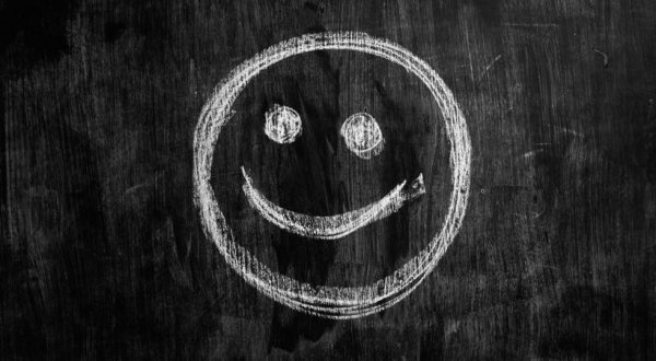 Рожица мелом на доске