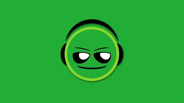 Смайлик на зеленом фоне