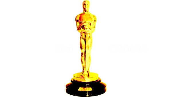 Статуэтка Оскар на зелёном фоне