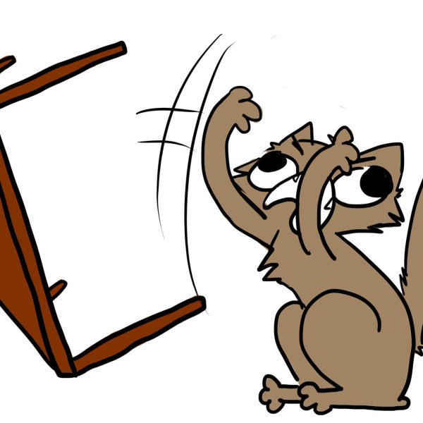 Человек переворачивает стол