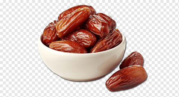 Косточка финика на белом фоне