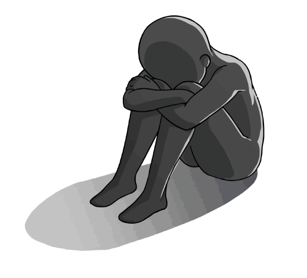 Человек сидит обняв колени