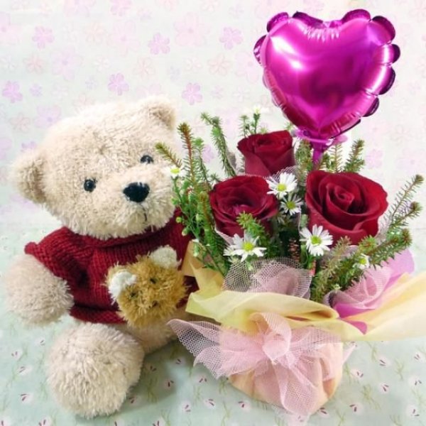 Медвежонок с цветами доброго