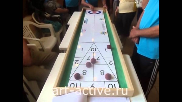 Шаффлборд аттракцион