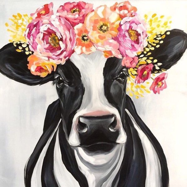 Корова с венком на голове