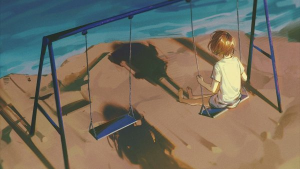 Одинокий мальчик на качелях