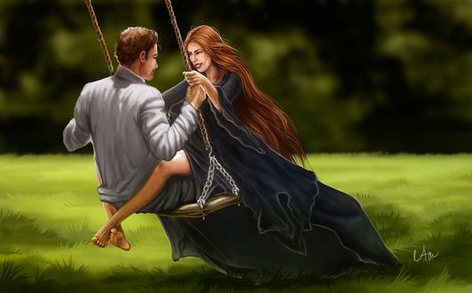 Парень и девушка на качелях