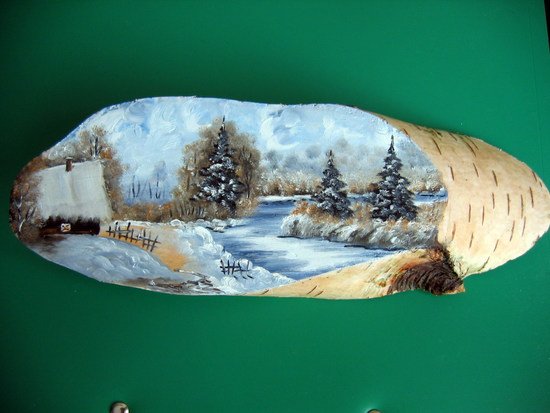 Отрезанный кусок дерева на нём роспись