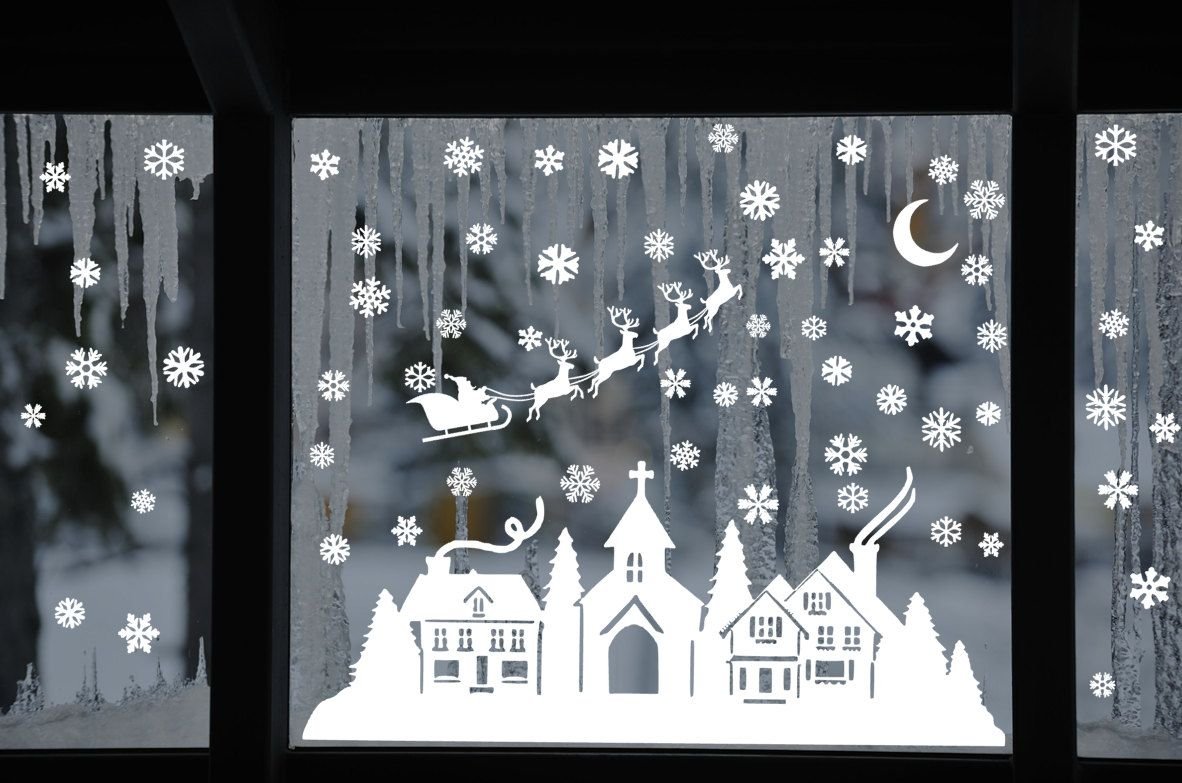 Украшение окна новогодней композицией