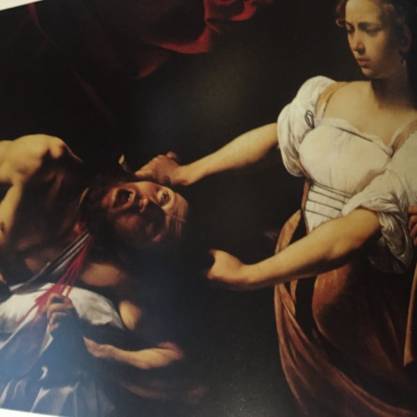 Юдифь обезглавливающая Олоферна Караваджо