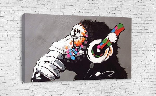 Картина шимпанзе в наушниках