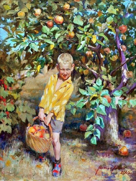 Мальчик собирает яблоки