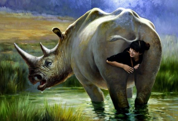 Девушка и носорог