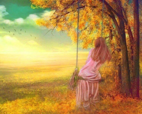 Девушка на качелях спиной осень