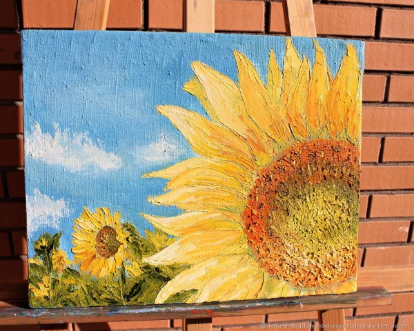 Картина подсолнухов в рамке
