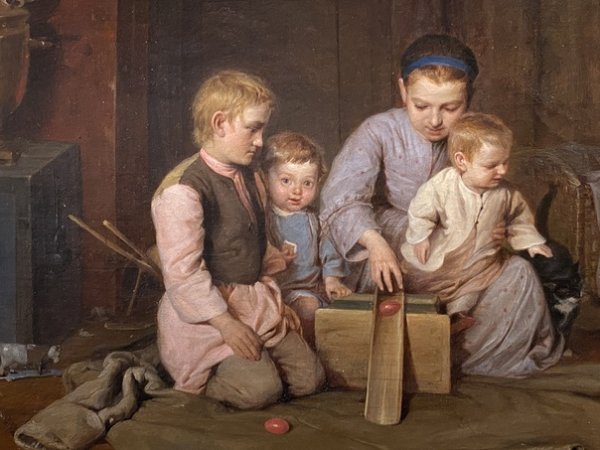 Дети катающие пасхальные яйца